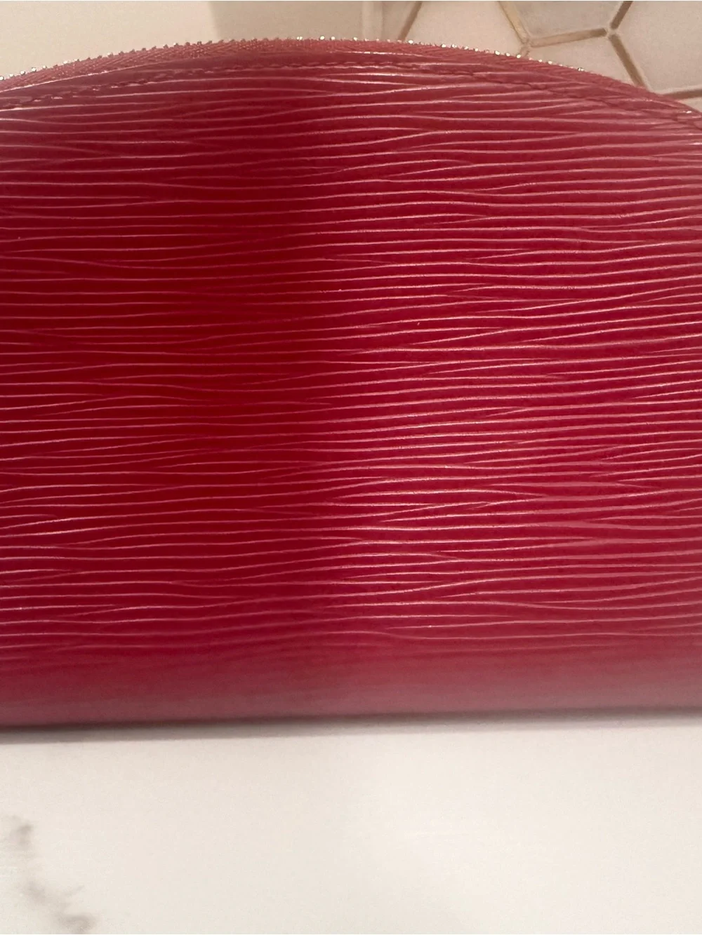 Authentic Louis Vuitton Red Textured Cosmetic Pouch